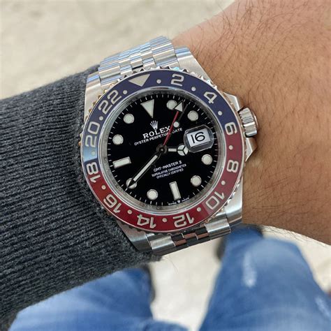 costo ghiera in colore azzurro e rosso orologio rolex|Sito ufficiale Rolex.